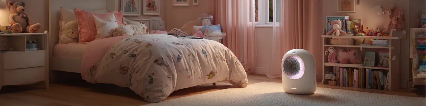 Climatiseur portable discret installé dans une chambre d'enfant, offrant confort thermique sans nuisance sonore