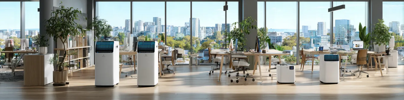 Climatiseurs portables performants rafraîchissant un espace de travail moderne pour maintenir la productivité